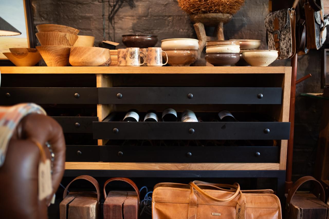 Oak wine rack with steel drawers. 42 bottles.