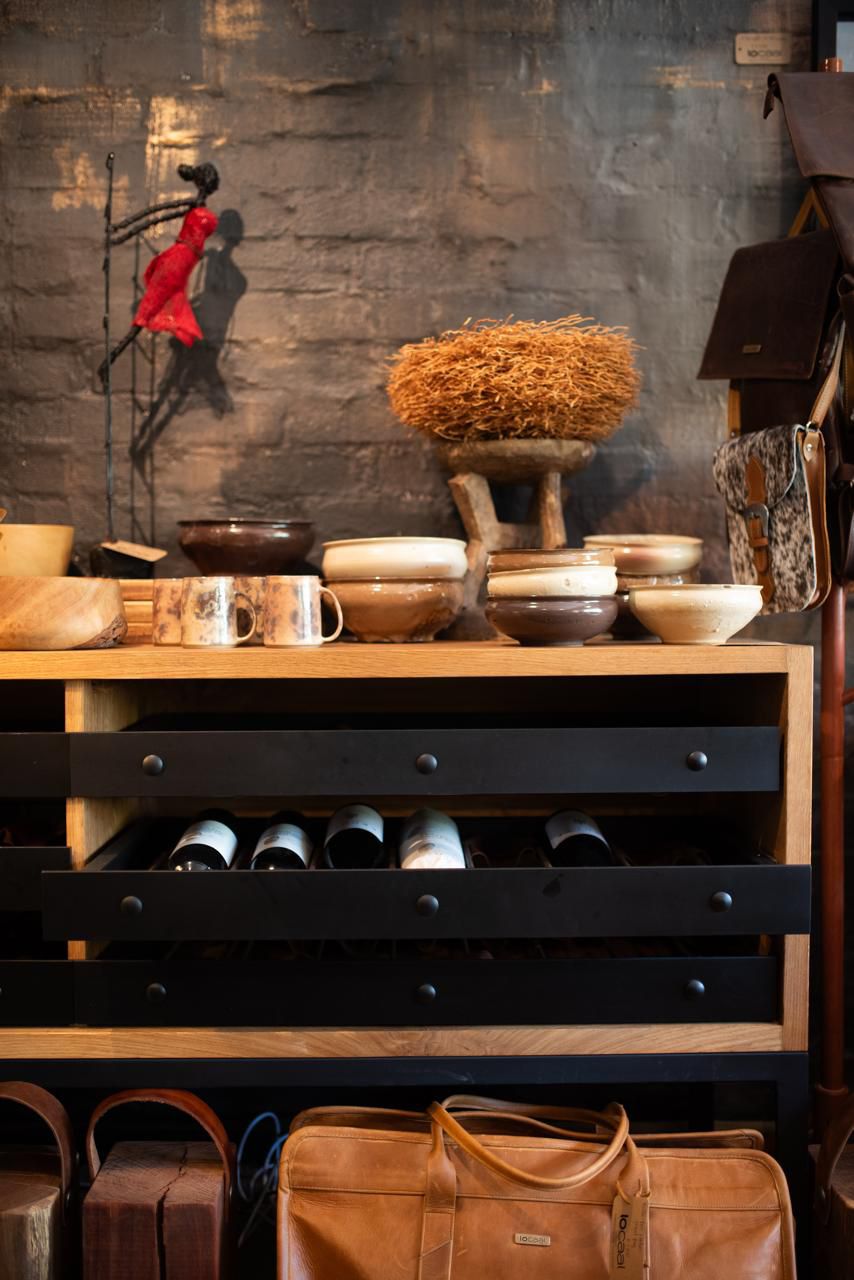 Oak wine rack with steel drawers. 42 bottles.