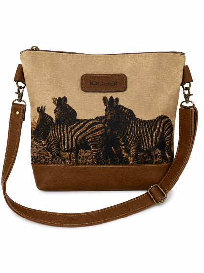 Marli sling bag with leather bottom and sling with canvas print