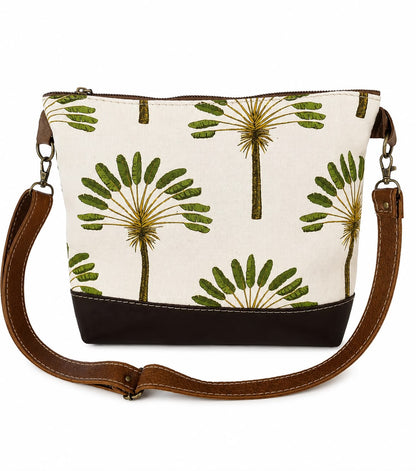 Marli sling bag with leather bottom and sling with canvas print