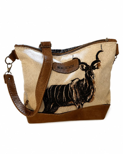 Marli sling bag with leather bottom and sling with canvas print