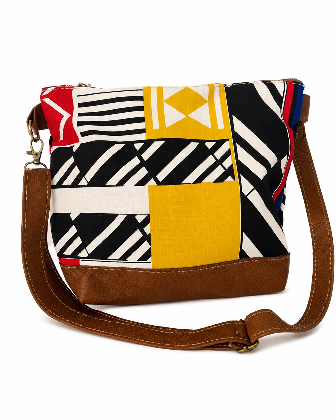 Marli sling bag with leather bottom and sling with canvas print