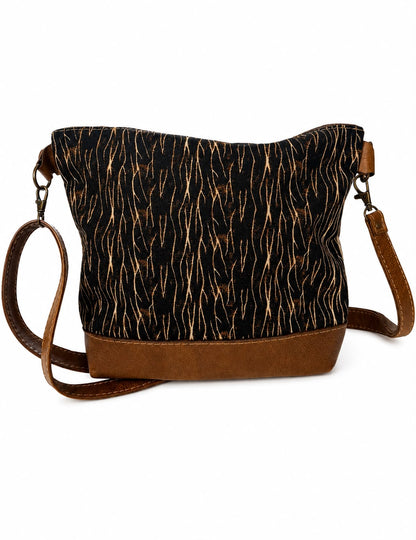 Marli sling bag with leather bottom and sling with canvas print