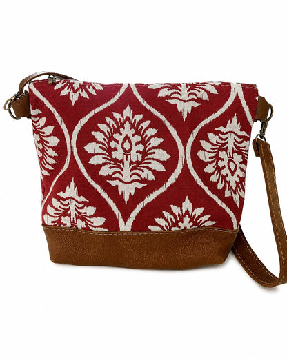 Marli sling bag with leather bottom and sling with canvas print