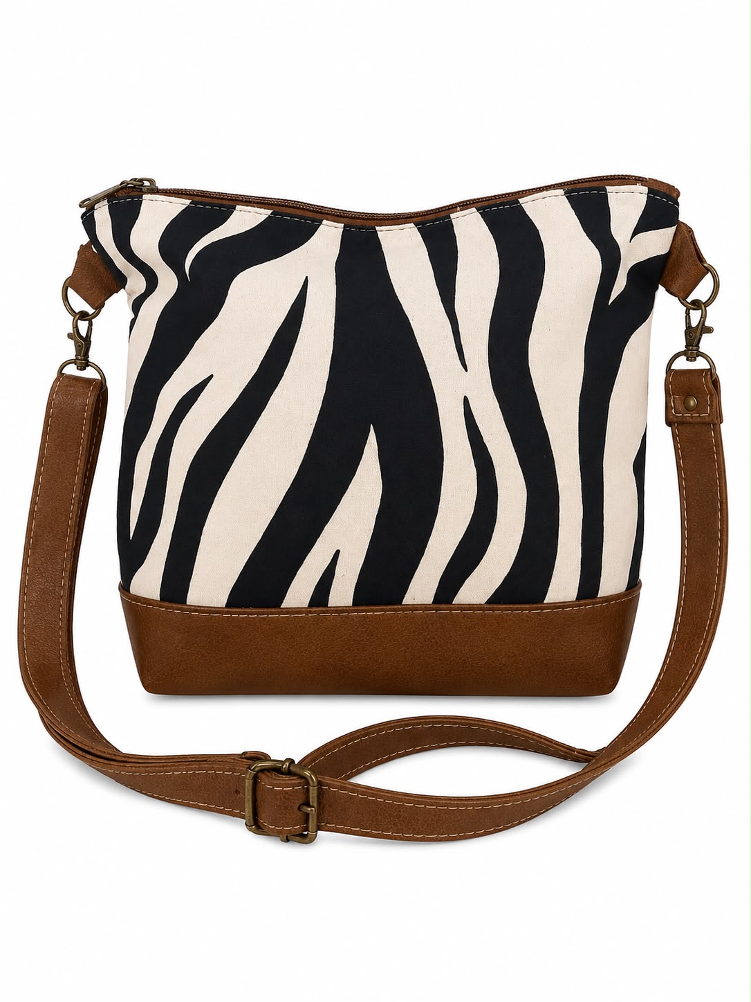 Marli sling bag with leather bottom and sling with canvas print