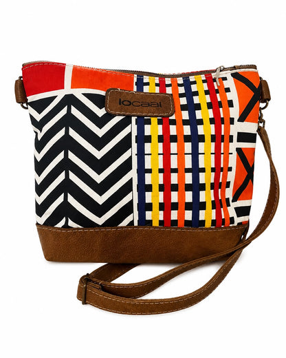 Marli sling bag with leather bottom and sling with canvas print