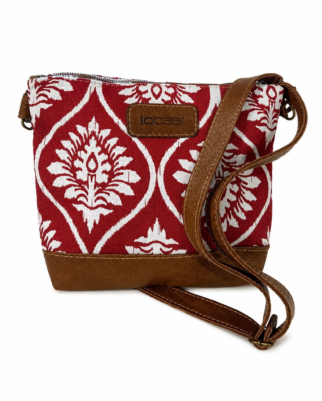 Marli sling bag with leather bottom and sling with canvas print