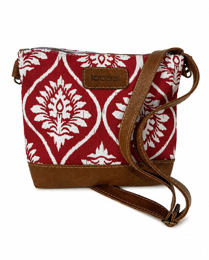 Marli sling bag with leather bottom and sling with canvas print