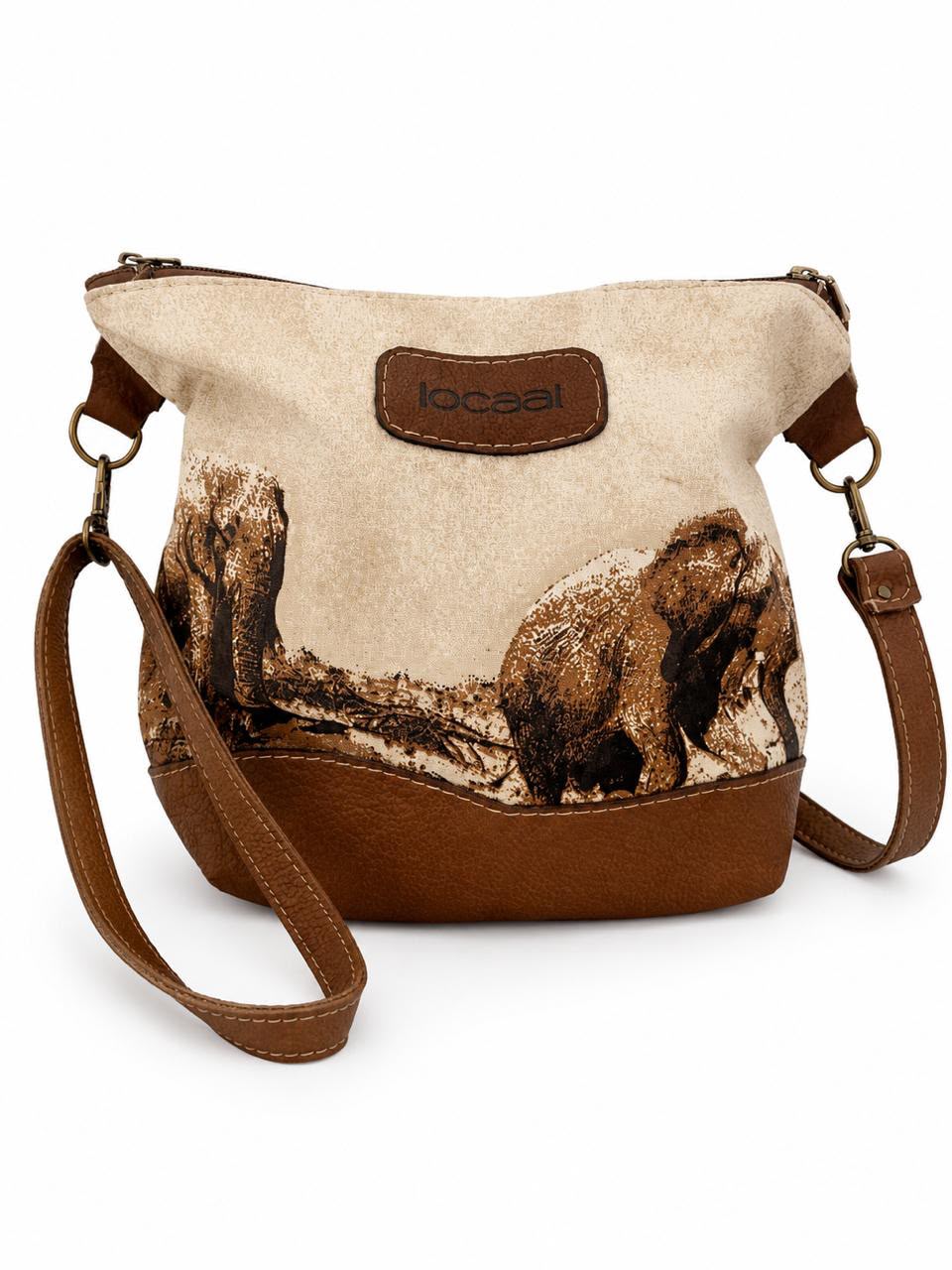 Marli sling bag with leather bottom and sling with canvas print