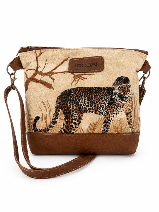 Marli sling bag with leather bottom and sling with canvas print