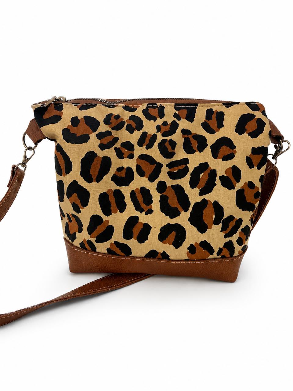 Marli sling bag with leather bottom and sling with canvas print