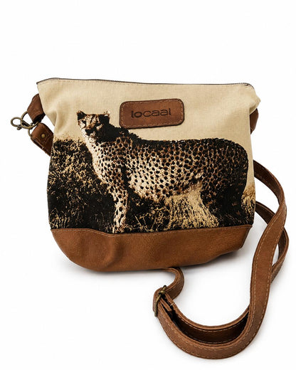Marli sling bag with leather bottom and sling with canvas print