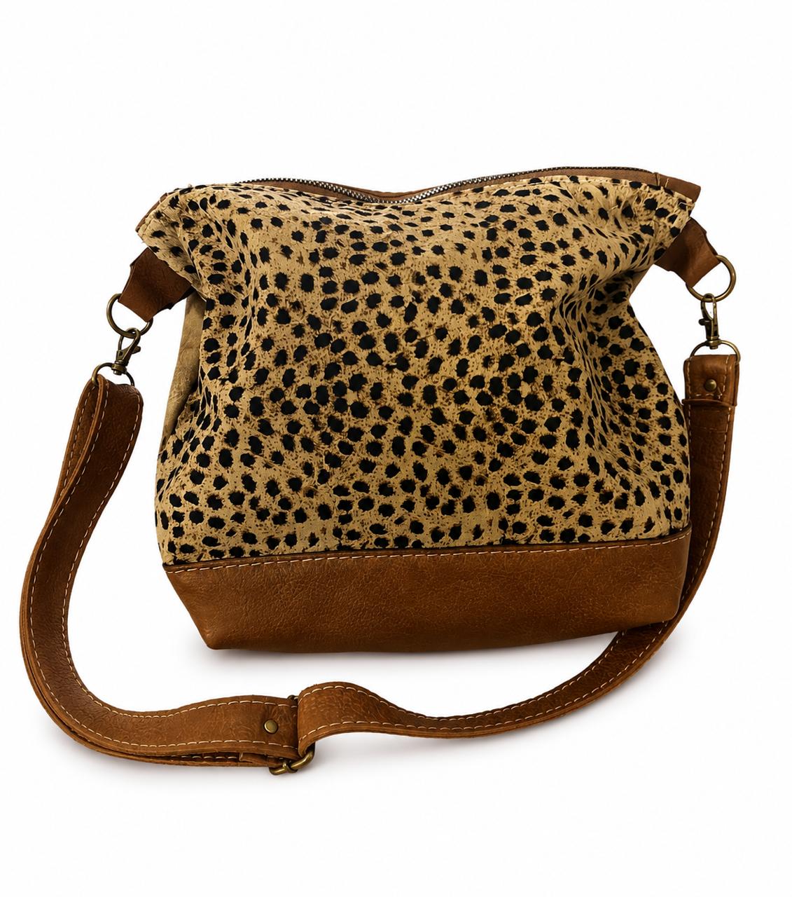 Marli sling bag with leather bottom and sling with canvas print